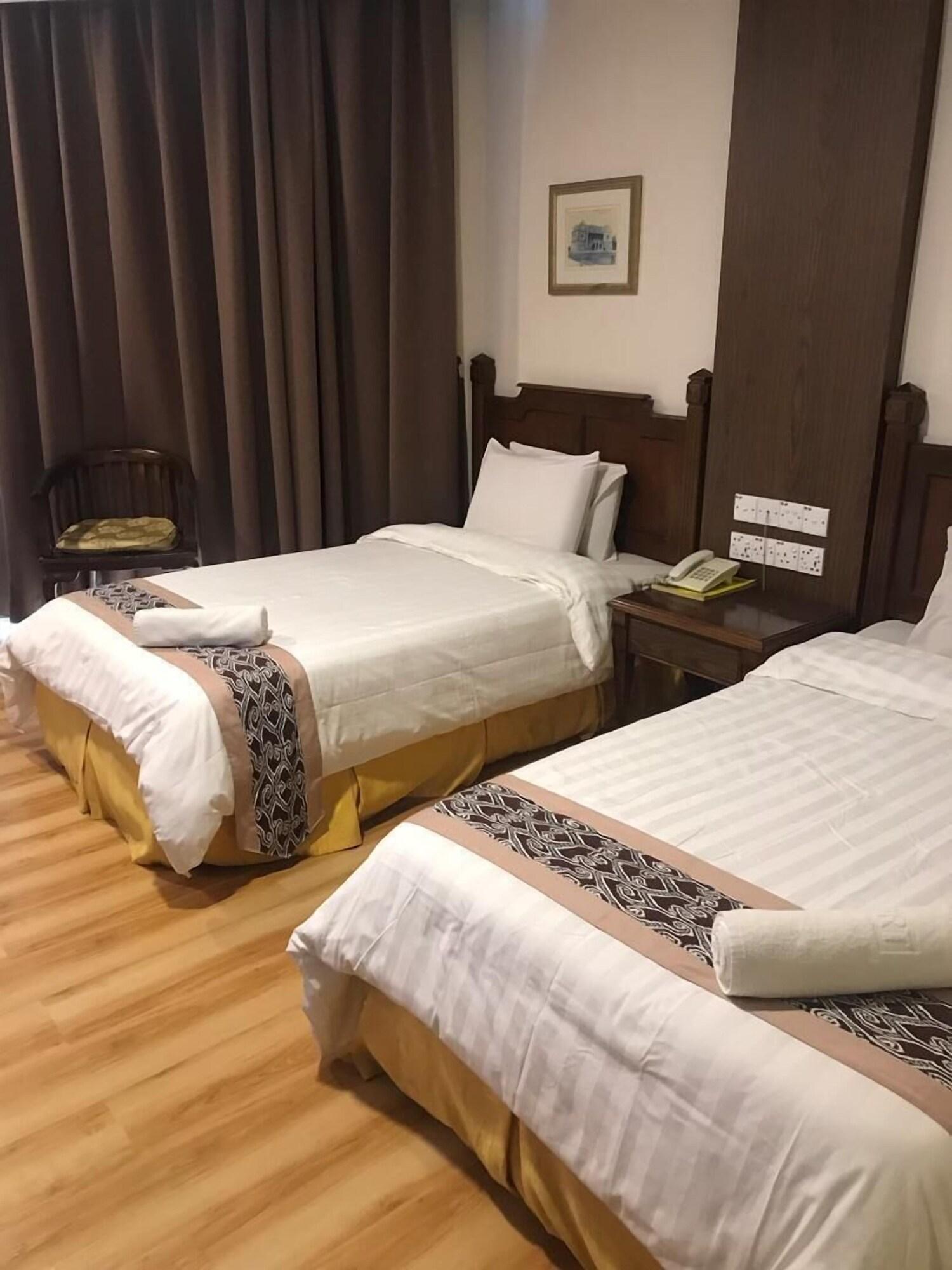 Regal Court Hotel Кучинг Экстерьер фото